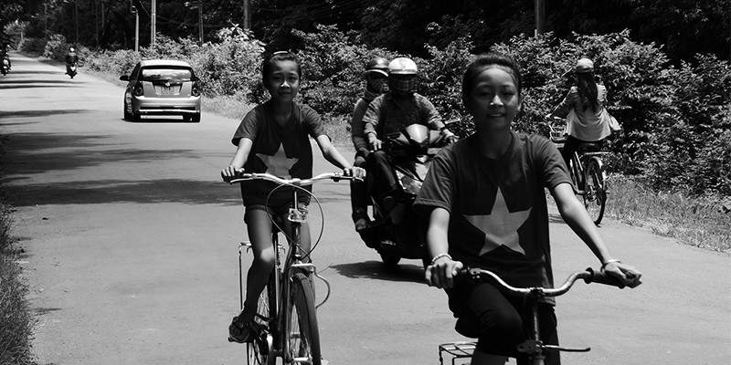 A Star in the East by Alex Rowe- Children Riding Bikes