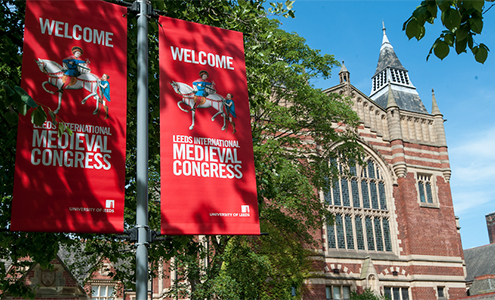 International Medieval Congress flags outside the Great Hall of Leeds
